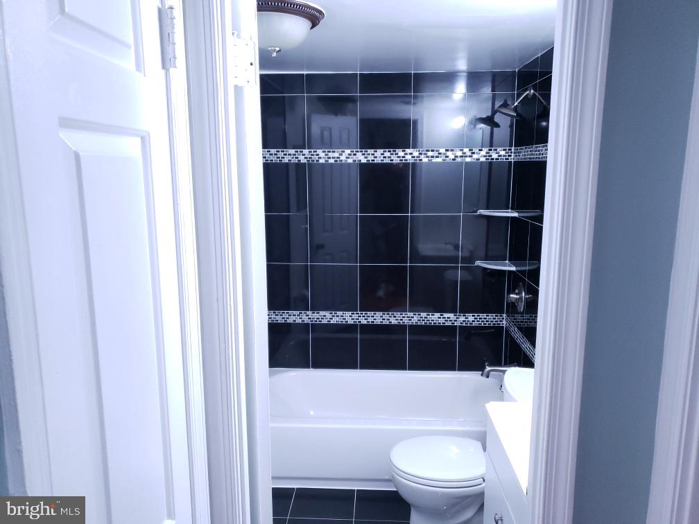 2016 37th Street Southeast, Unit 202 Washington, DC 20020 - Photo 19 of 21 Renovated bathroom