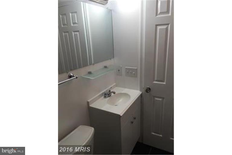 2016 37th Street Southeast, Unit 202 Washington, DC 20020 - Photo 4 of 21 Renovated bathroom