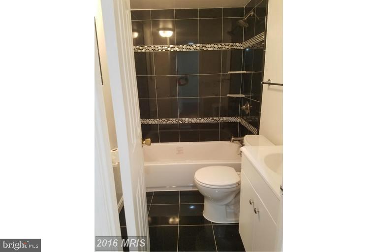 2016 37th Street Southeast, Unit 202 Washington, DC 20020 - Photo 6 of 21 Renovated bathroom