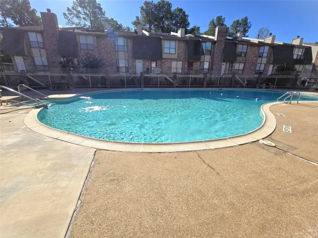 a view of outdoor space yard and swimming pool