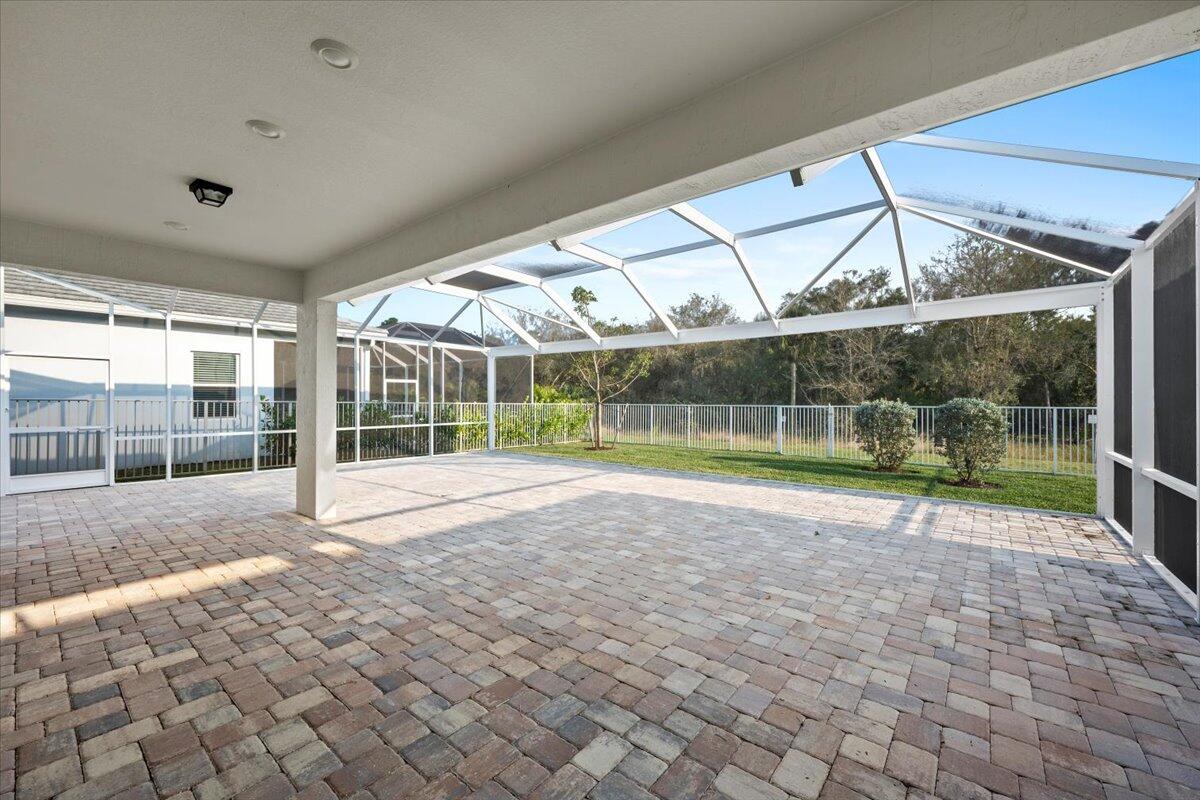 9915 Southwest Meridian Way Stuart, FL 34997 - Photo 2 of 35 Screened-In Extended Patio