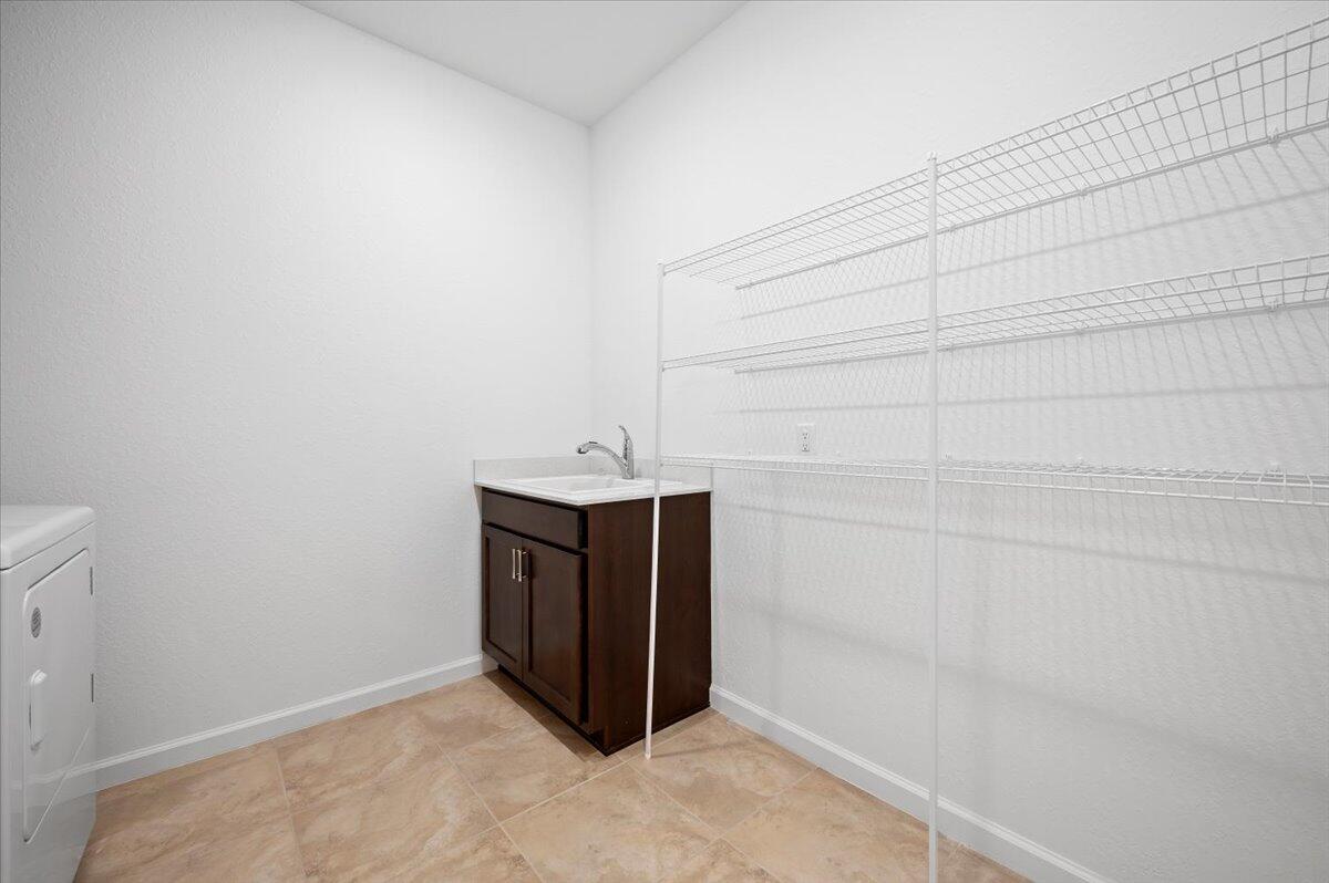 9915 Southwest Meridian Way Stuart, FL 34997 - Photo 31 of 35 Laundry Room
