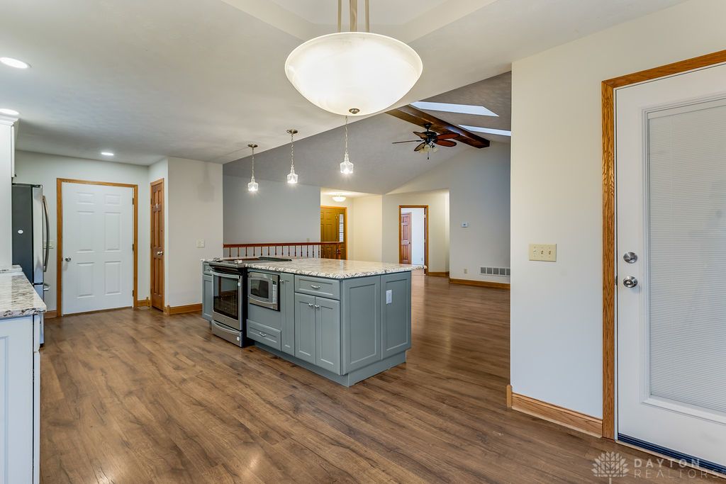 7400 Cook-Jones Road Waynesville, OH 45068 - Photo 41 of 72 Bright, inviting kitchen boasts a practical island and ample floor space.
