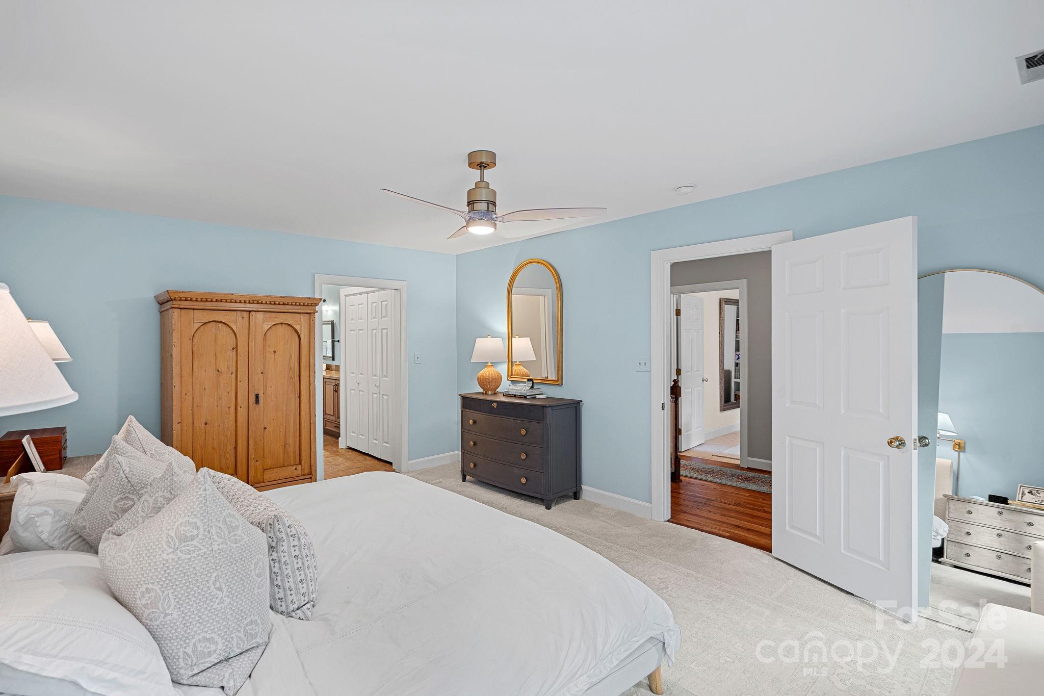 3000 Heathgate Road Charlotte, NC 28226 - Photo 18 of 48 a bedroom with a bed and a dresser