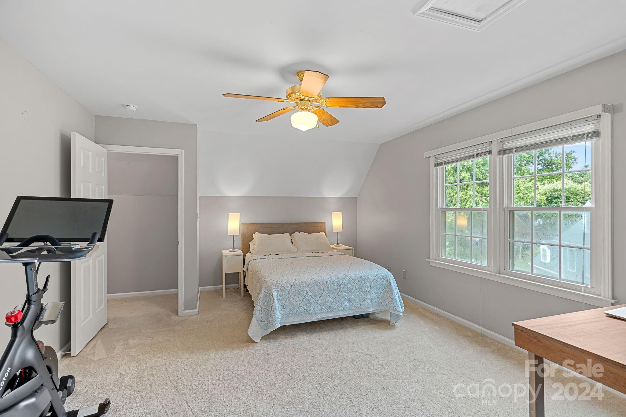 3000 Heathgate Road Charlotte, NC 28226 - Photo 29 of 48 a bedroom with a bed and a chandelier