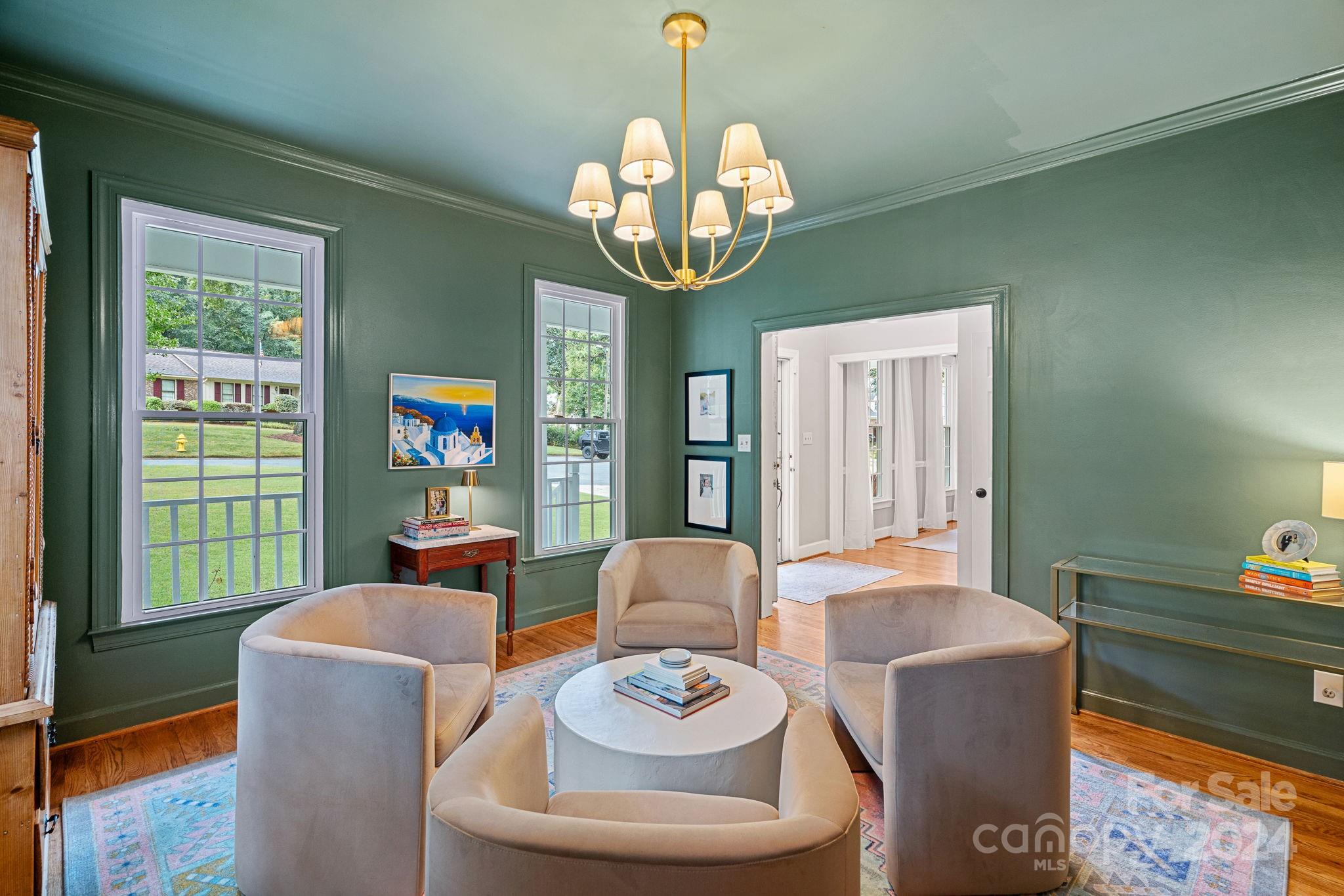 3000 Heathgate Road Charlotte, NC 28226 - Photo 3 of 48 a view of a dining room with furniture window and wooden floor