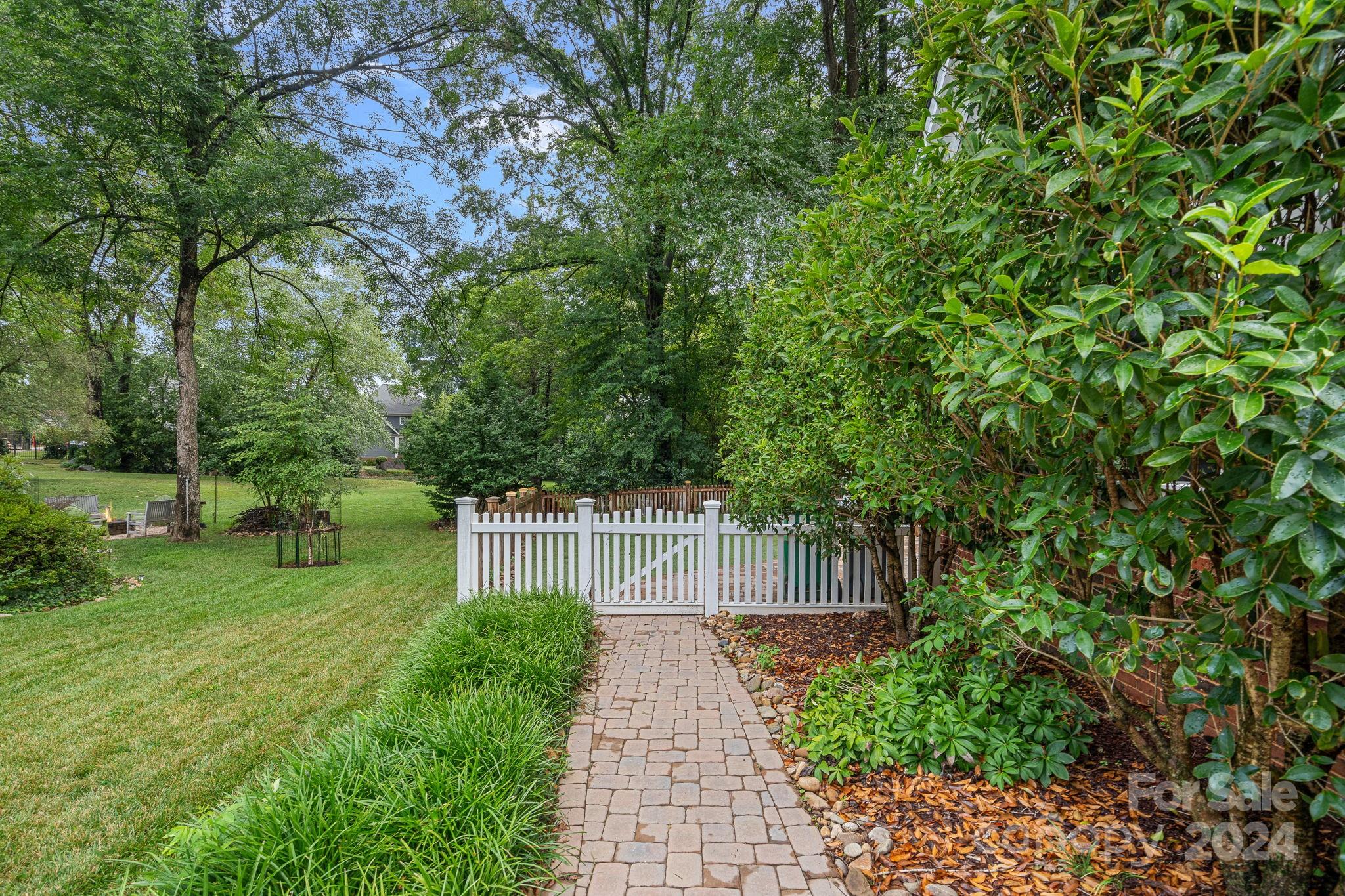 3000 Heathgate Road Charlotte, NC 28226 - Photo 38 of 48 a view of a house with a yard