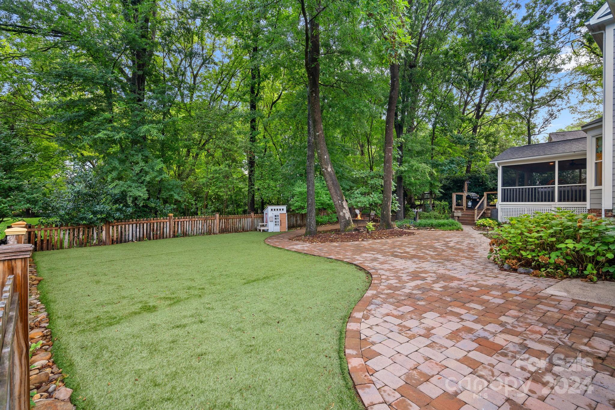 3000 Heathgate Road Charlotte, NC 28226 - Photo 39 of 48 a view of a backyard with large trees