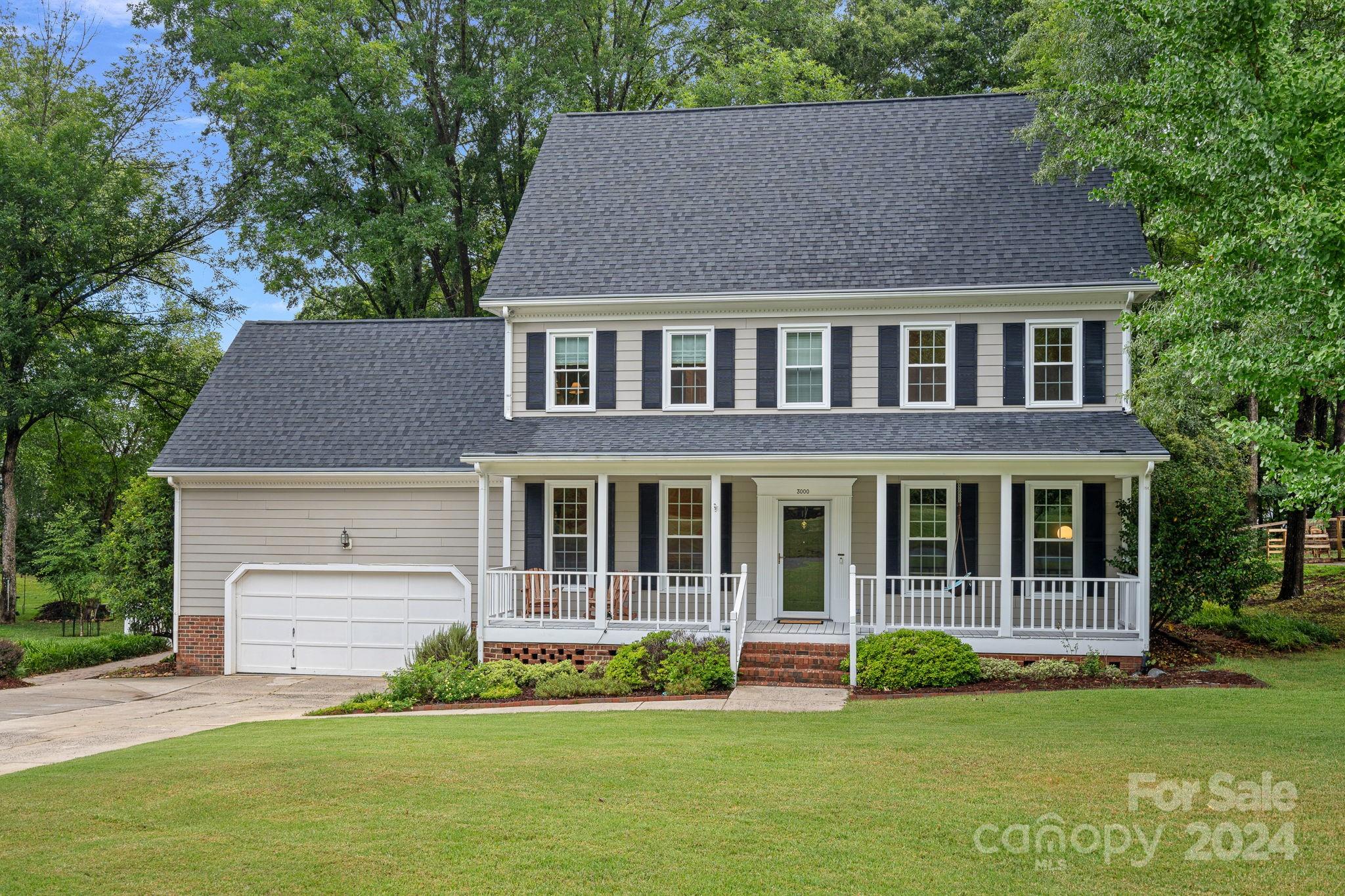 3000 Heathgate Road Charlotte, NC 28226 - Photo 48 of 48 a front view of a house with a yard