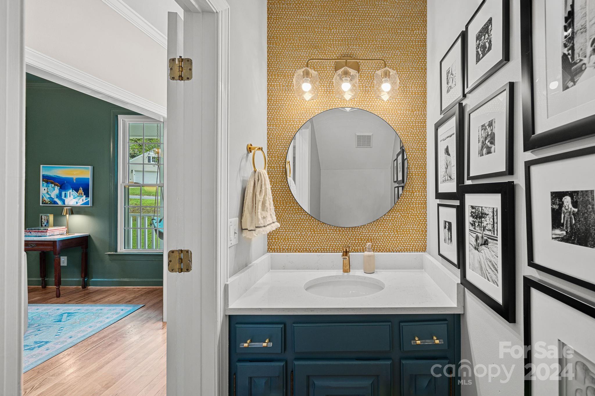 3000 Heathgate Road Charlotte, NC 28226 - Photo 9 of 48 a bathroom with a sink a mirror and a shower