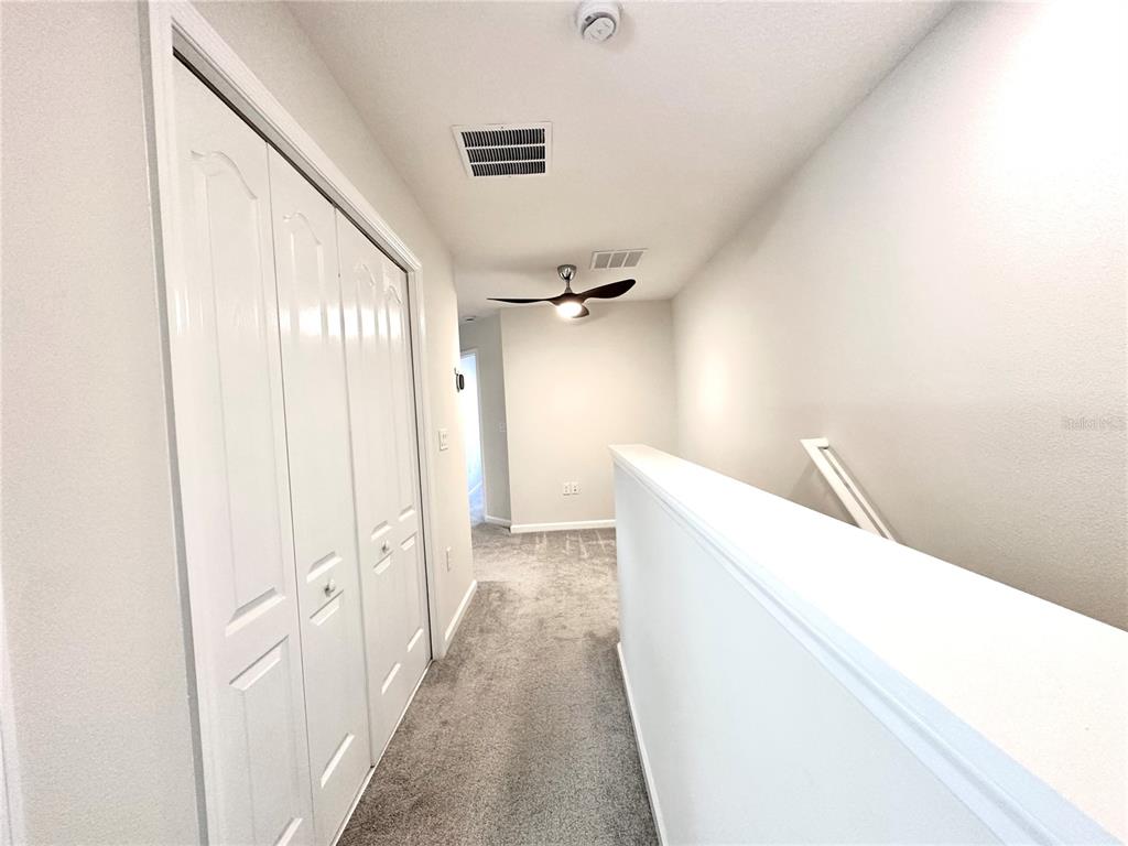 2767 North Narcoossee Road, Unit 2767 St. Cloud, FL 34771 - Photo 16 of 19 a view of hallway