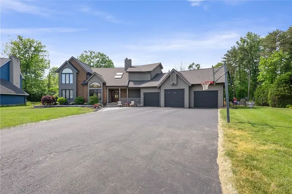 $699,900 | 25 Country Wood Landing, Greece, NY 14626