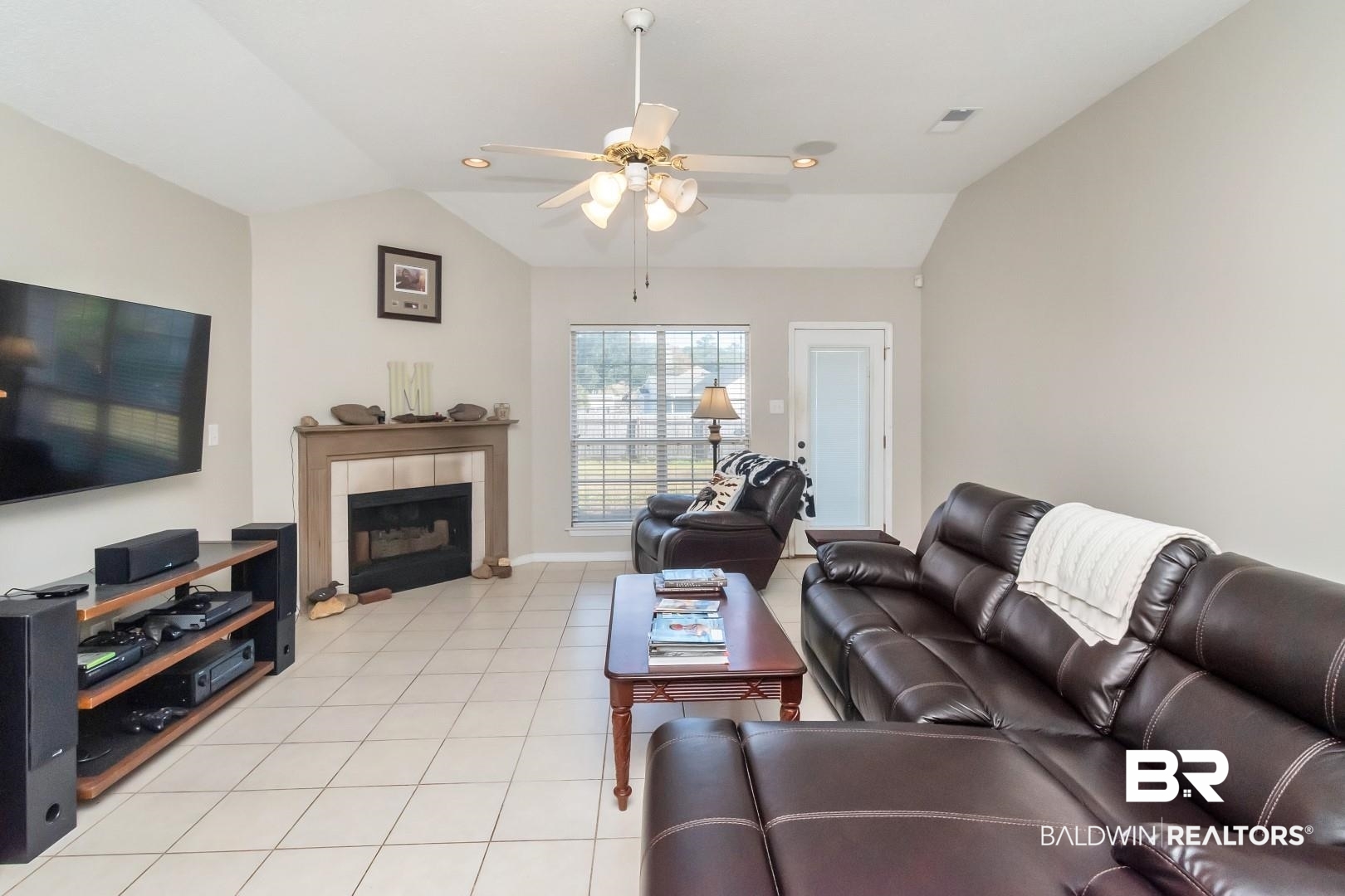 29221 Canterbury Road Daphne, AL 36526 - Photo 5 of 17 Tiled living room with ceiling fan and vaulted ceiling