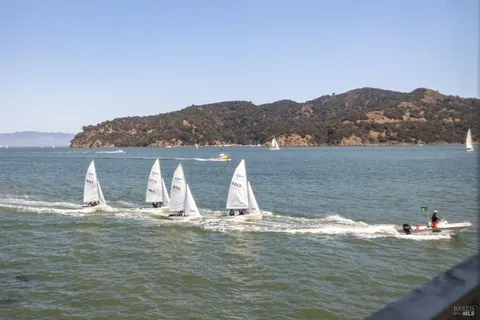 a view of a water with a mountain in the background
