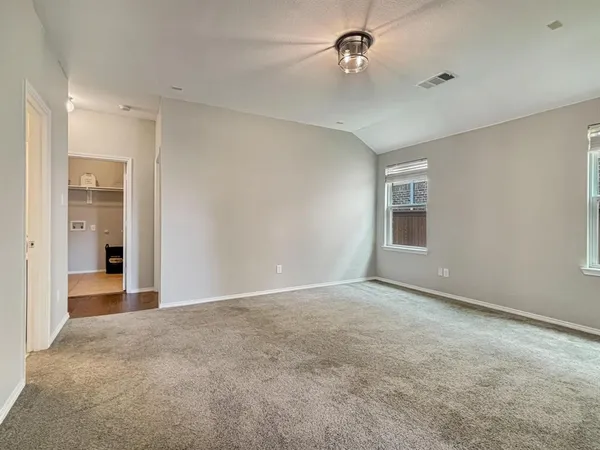 an empty room with windows