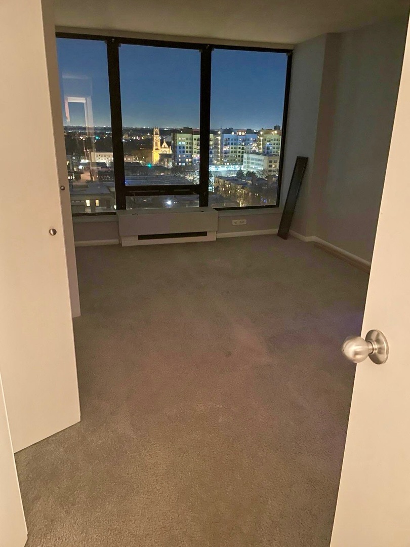 5445 North Sheridan Road, Unit 1603 Chicago, IL 60640 - Photo 21 of 40 a view of an empty room with window