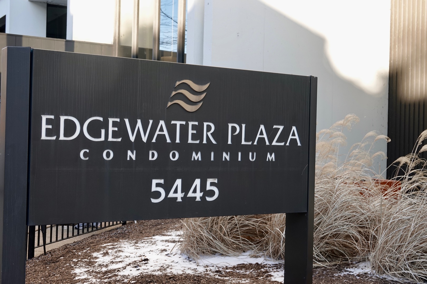 5445 North Sheridan Road, Unit 1603 Chicago, IL 60640 - Photo 3 of 40 a view of a wooden door