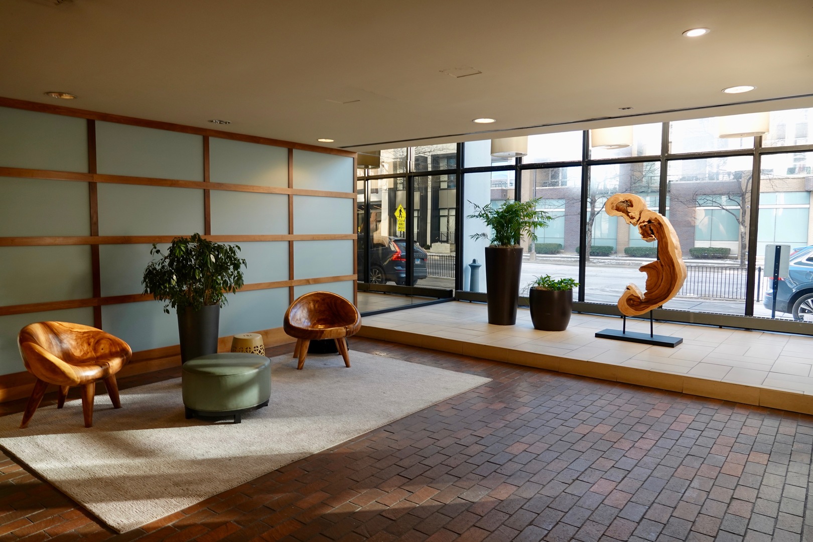 5445 North Sheridan Road, Unit 1603 Chicago, IL 60640 - Photo 7 of 40 a dining room with furniture and floor to ceiling window