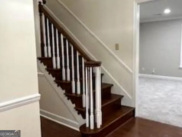 a view of an empty room with a fireplace