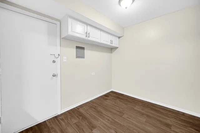 a view of small space with wooden floor