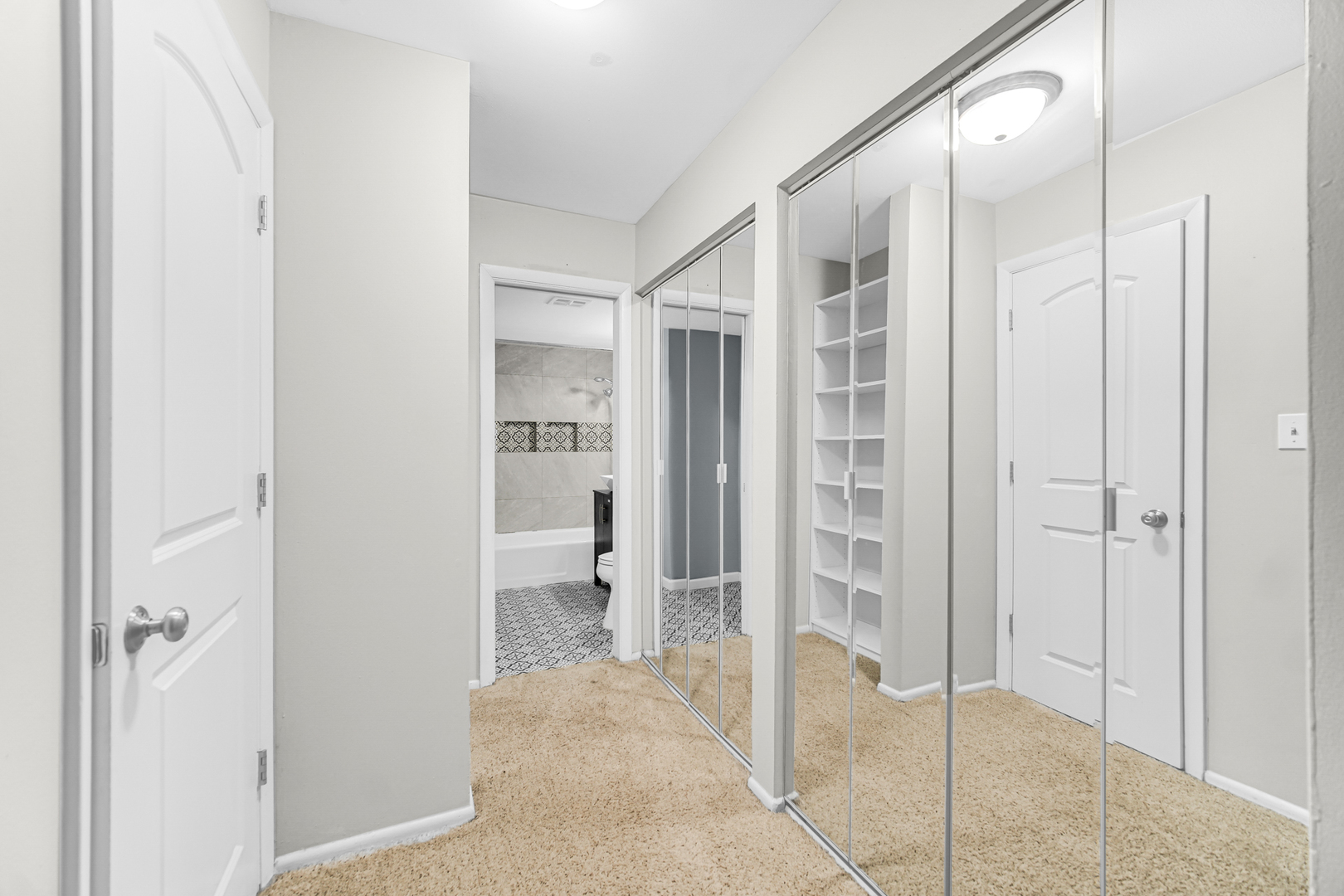 1320 Lore Lane, Unit 107B Lombard, IL 60148 - Photo 30 of 48 a bathroom with a glass shower door