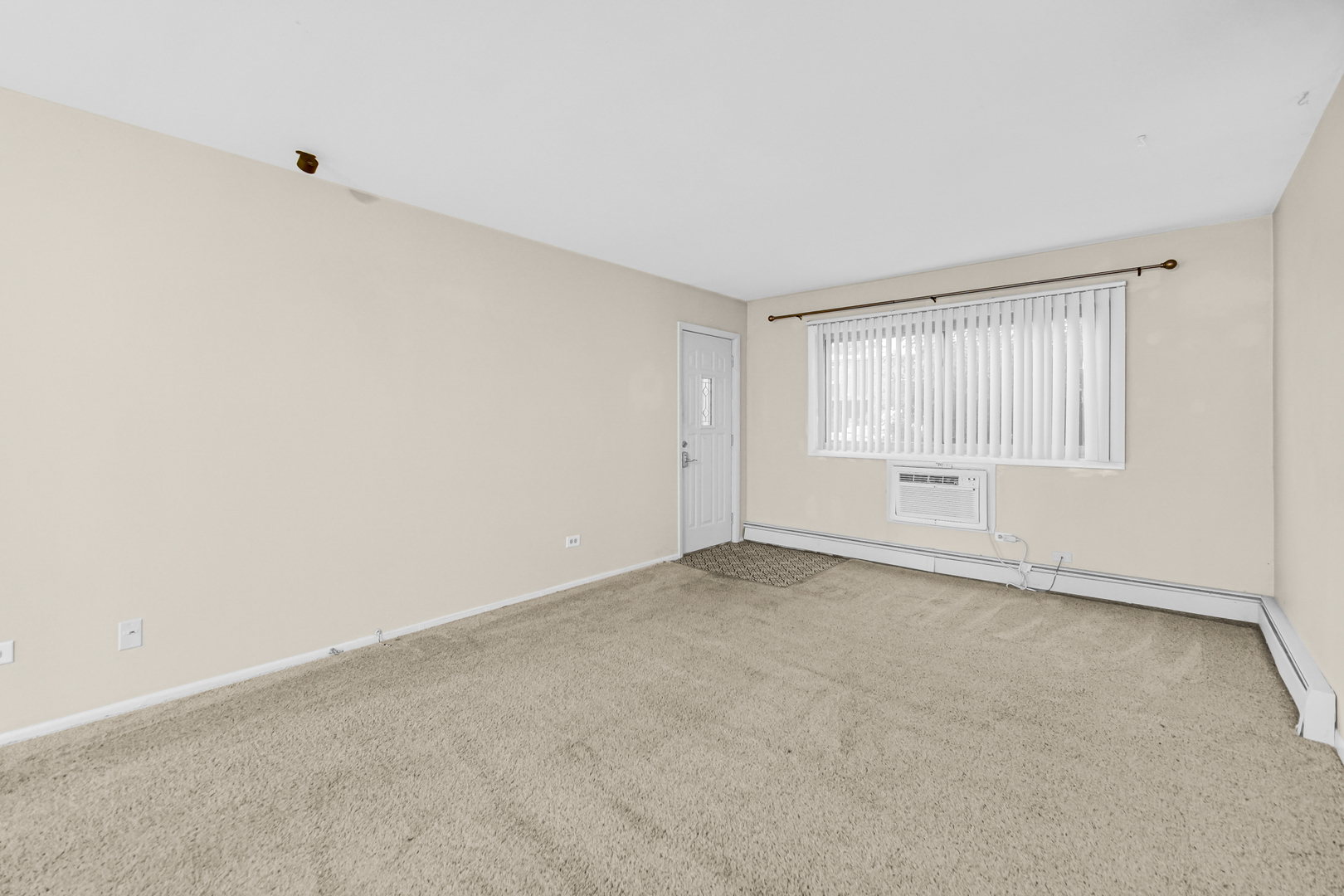 1320 Lore Lane, Unit 107B Lombard, IL 60148 - Photo 31 of 48 a view of an empty room with a window