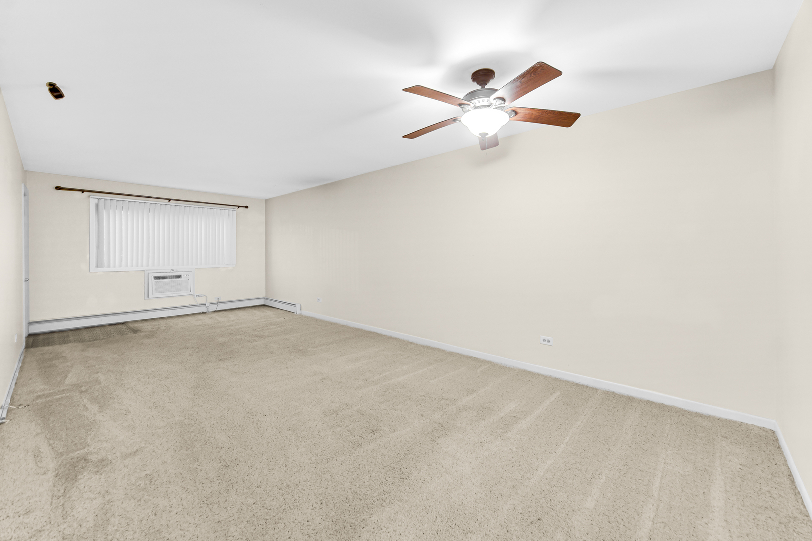 1320 Lore Lane, Unit 107B Lombard, IL 60148 - Photo 32 of 48 wooden floor in an empty room