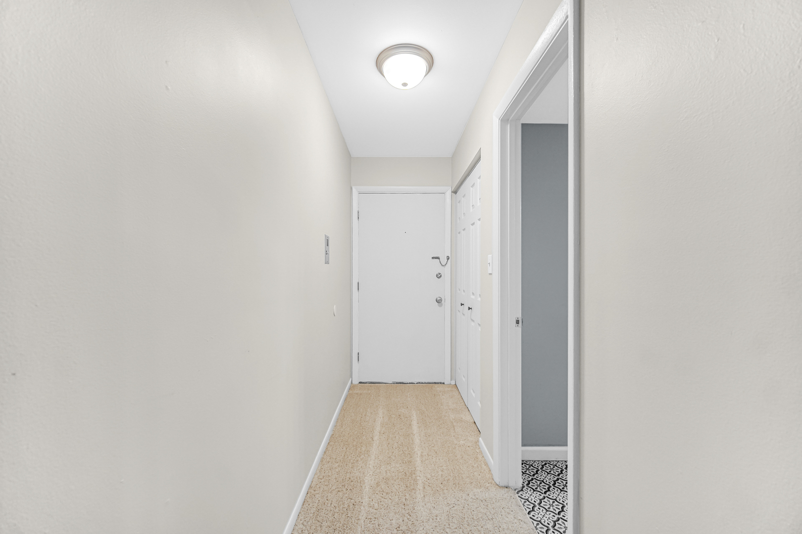 1320 Lore Lane, Unit 107B Lombard, IL 60148 - Photo 34 of 48 a view of a hallway with wooden floor