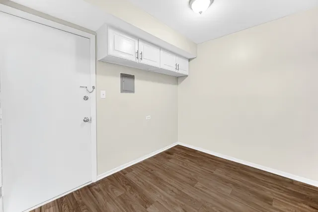 a view of small space with wooden floor