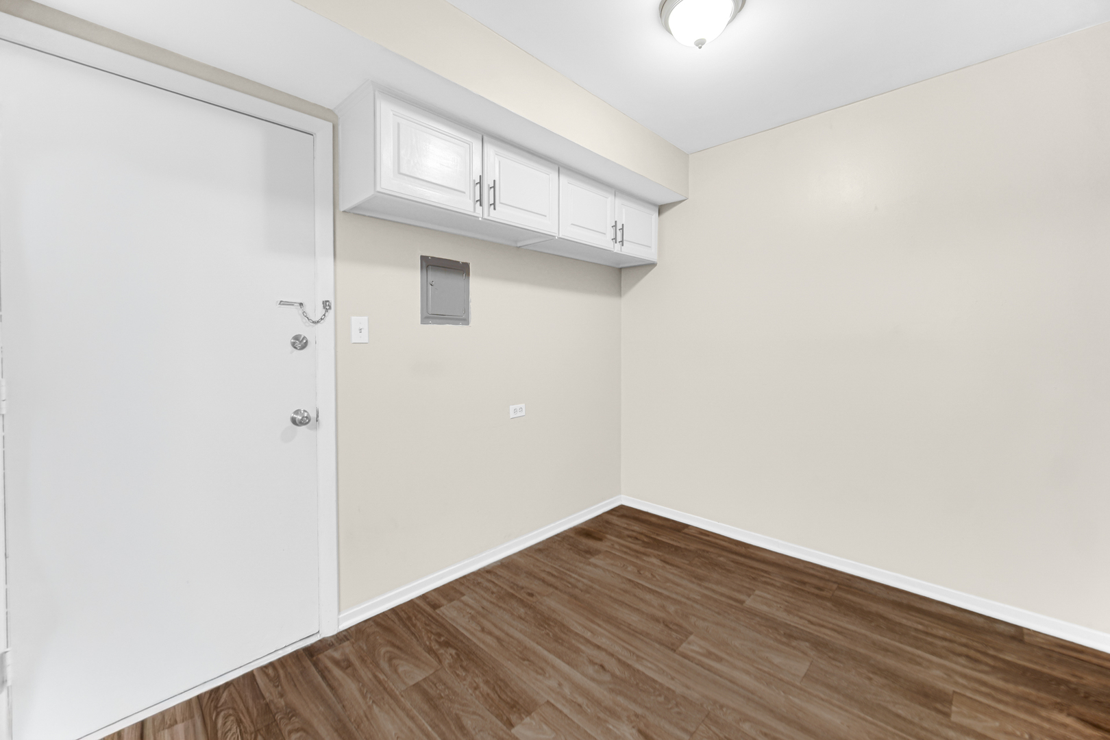 1320 Lore Lane, Unit 107B Lombard, IL 60148 - Photo 36 of 48 a view of small space with wooden floor