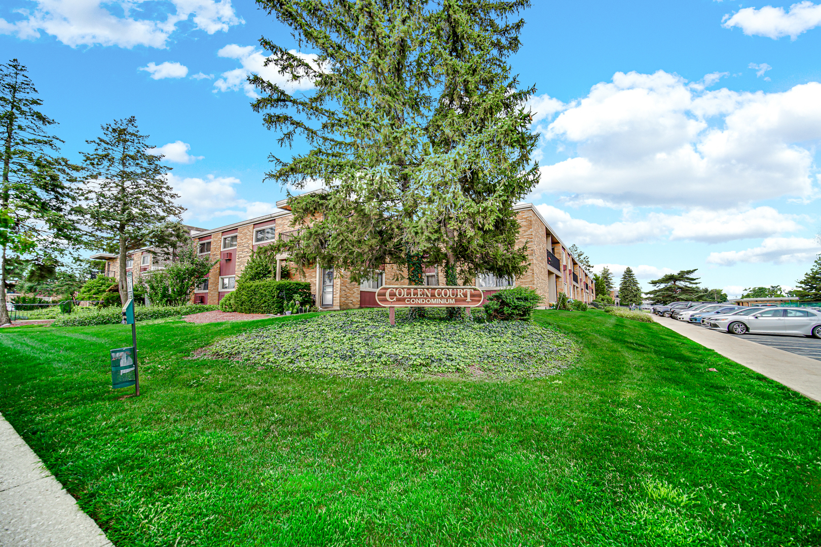 1320 Lore Lane, Unit 107B Lombard, IL 60148 - Photo 39 of 48 a view of a garden with a fountain