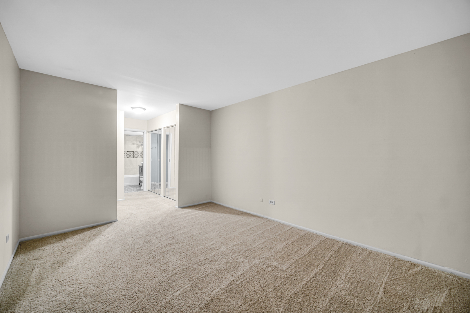 1320 Lore Lane, Unit 107B Lombard, IL 60148 - Photo 5 of 48 a view of an empty room