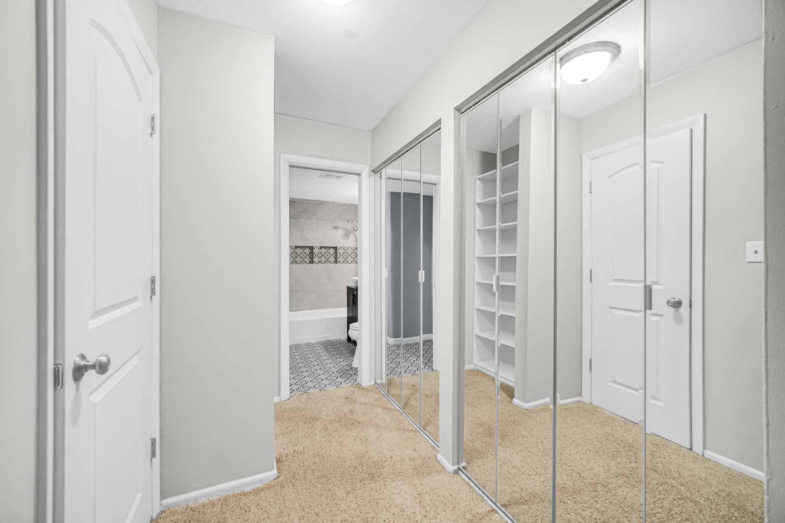 1320 Lore Lane, Unit 107B Lombard, IL 60148 - Photo 6 of 48 a bathroom with a glass shower door