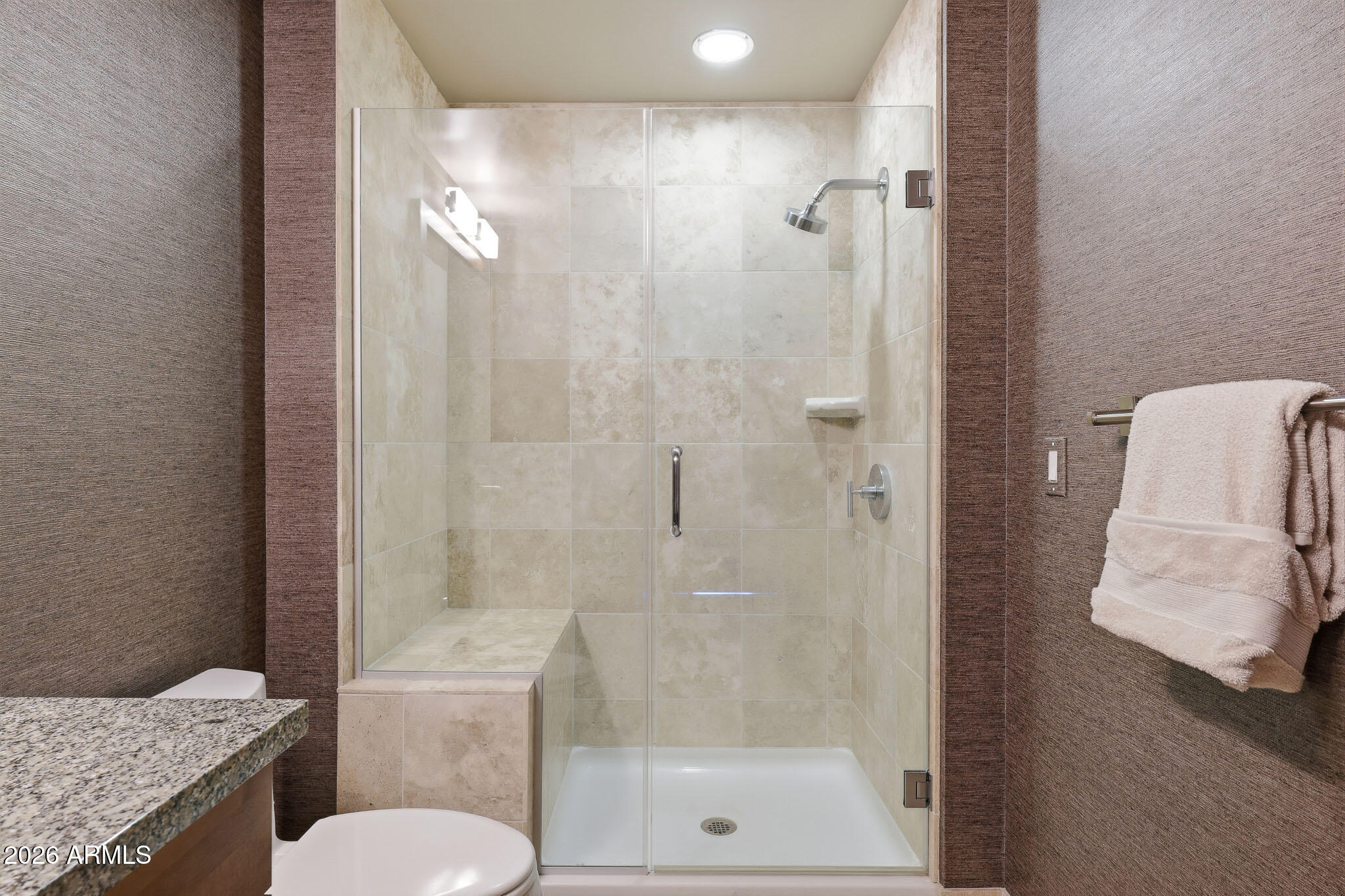 310 South 4th Street, Unit 2204 Phoenix, AZ 85004 - Photo 41 of 66 a bathroom with a granite countertop sink toilet and shower
