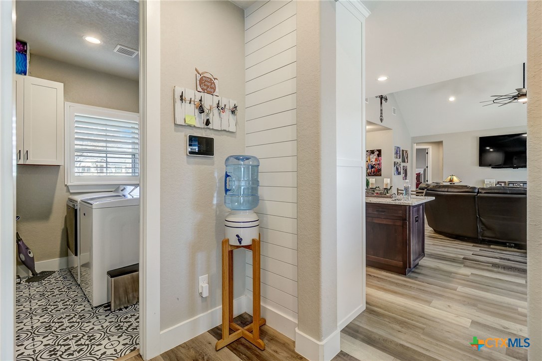 281 Cibolo Way La Vernia, TX 78121 - Photo 15 of 47 a bathroom with a sink a mirror and a shower