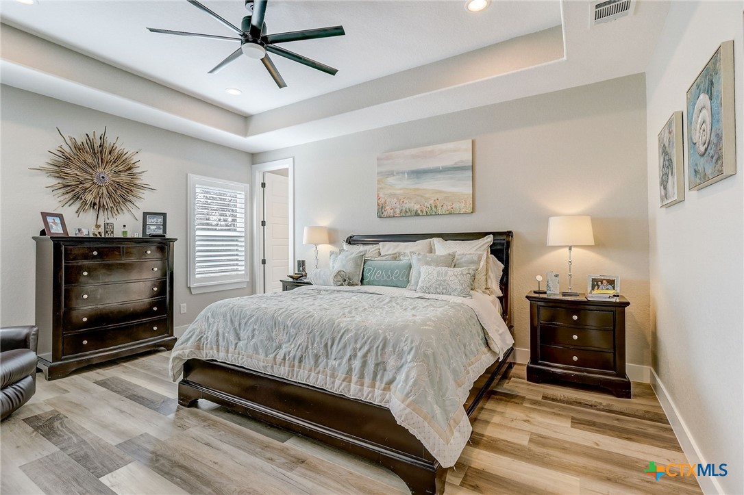 281 Cibolo Way La Vernia, TX 78121 - Photo 20 of 47 a bedroom with a bed and a television