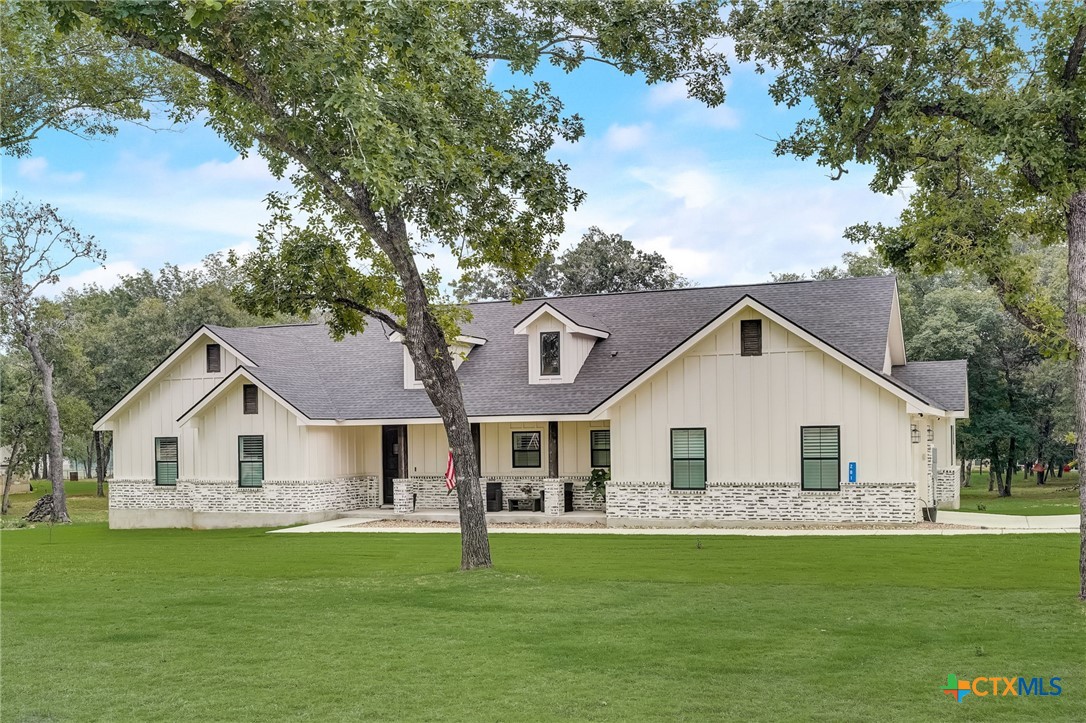 281 Cibolo Way La Vernia, TX 78121 - Photo 2 of 47 a view of a yard in front of the house