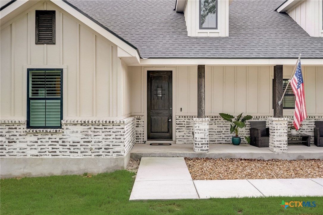 281 Cibolo Way La Vernia, TX 78121 - Photo 21 of 47 a front view of a house with garden