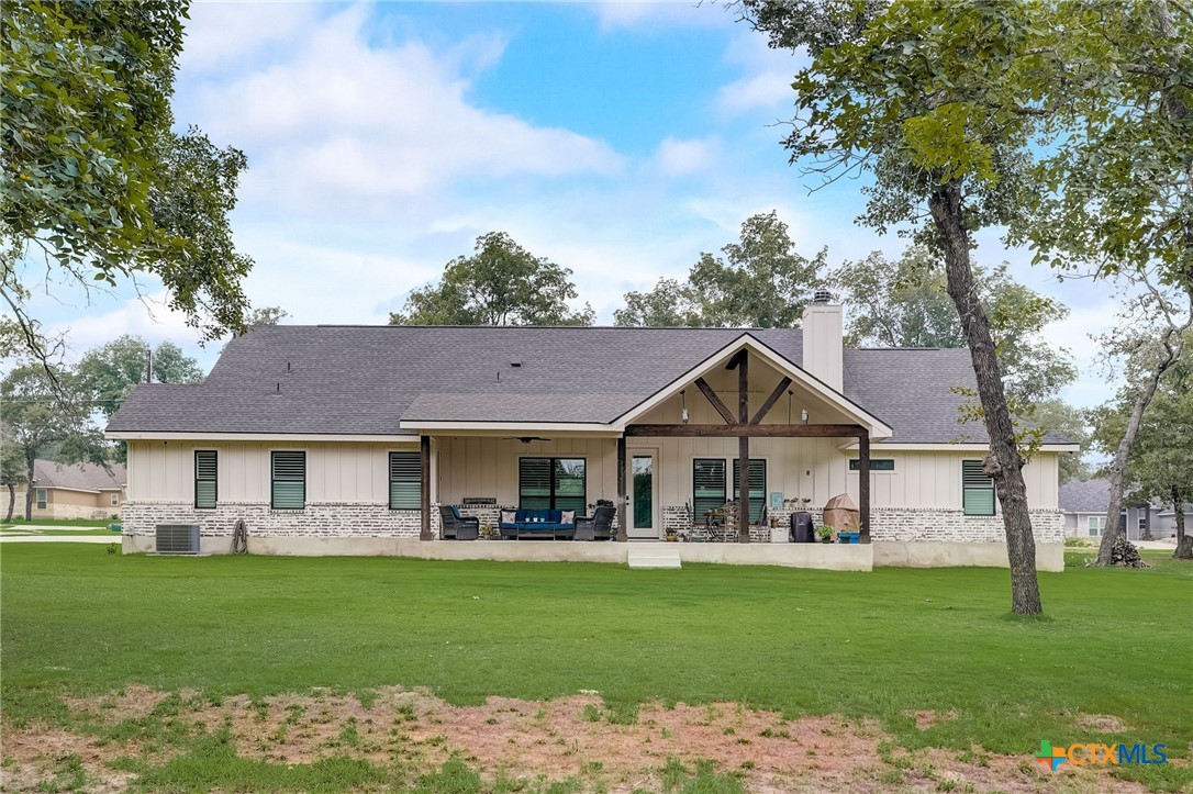 281 Cibolo Way La Vernia, TX 78121 - Photo 45 of 47 a front view of a house with a garden