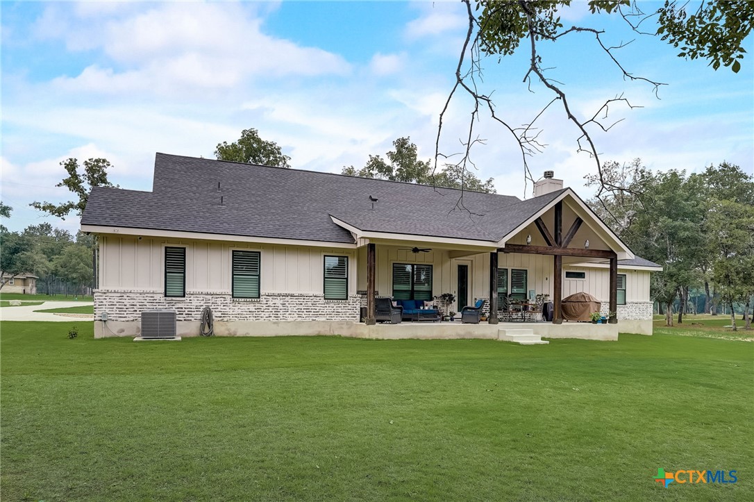 281 Cibolo Way La Vernia, TX 78121 - Photo 46 of 47 a front view of house with yard and green space