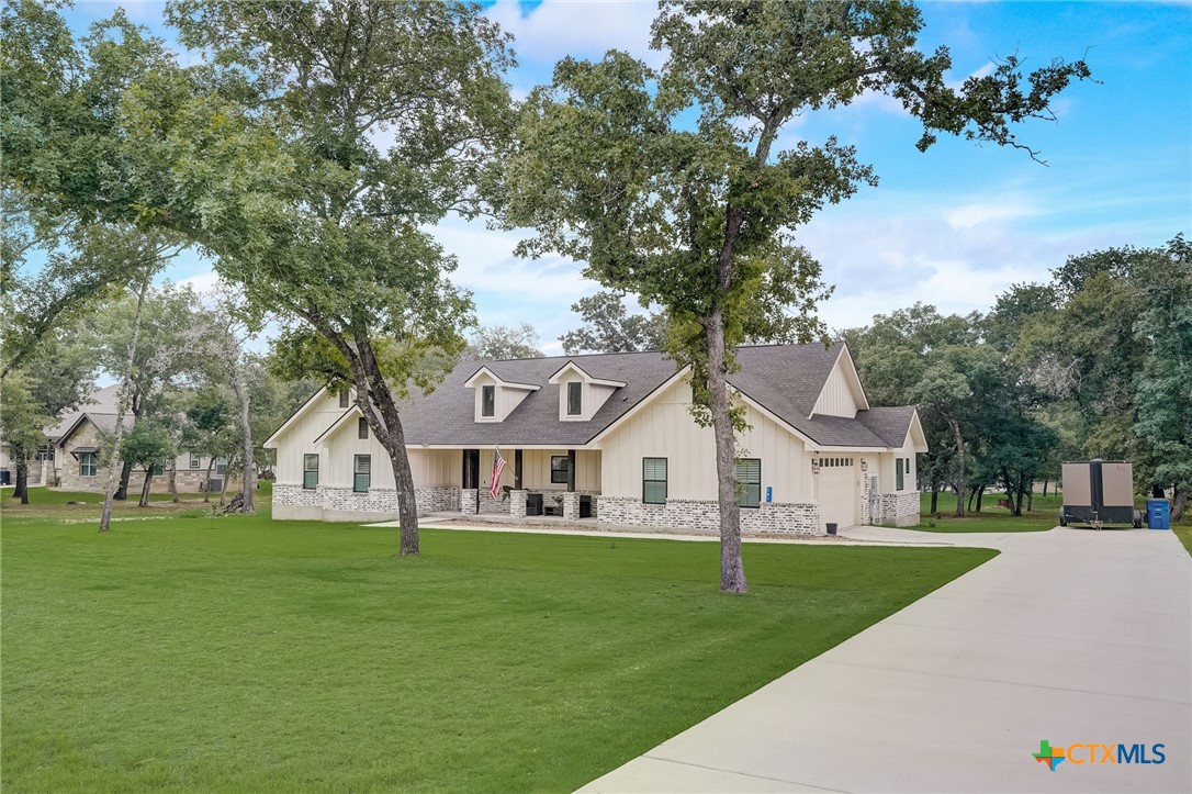 281 Cibolo Way La Vernia, TX 78121 - Photo 5 of 47 a view of house that has a yard