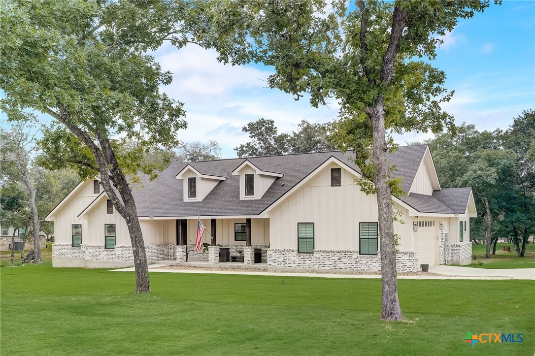 281 Cibolo Way La Vernia, TX 78121 - Photo 6 of 47 a front view of a residential houses with yard and green space