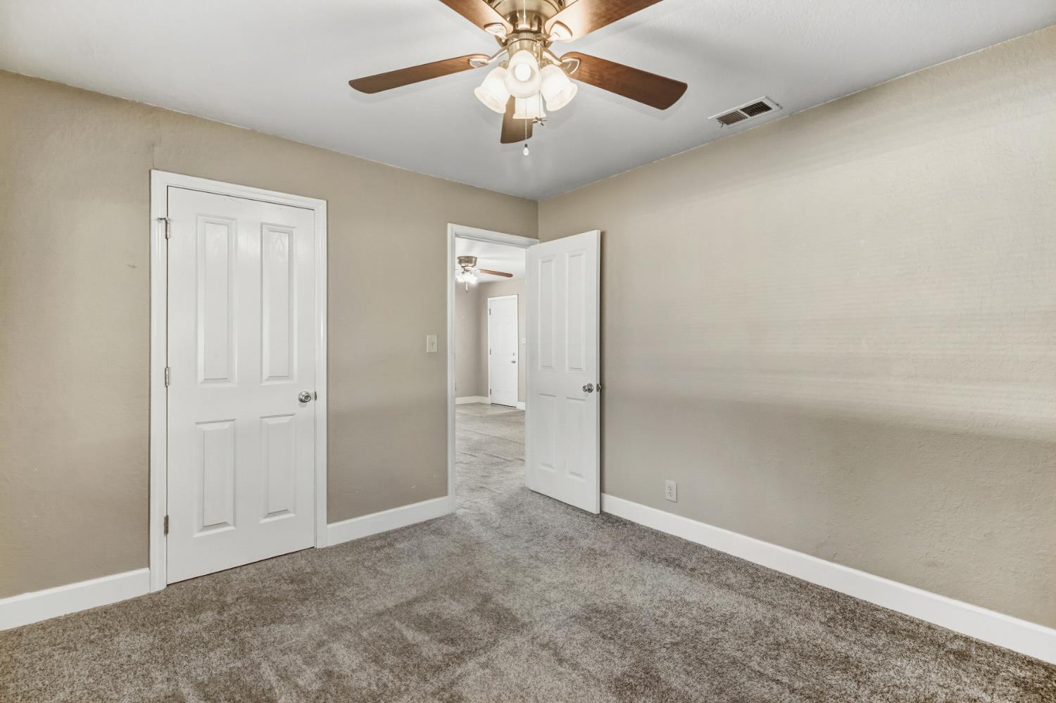 3140 Brennans Road Loomis, CA 95650 - Photo 11 of 45 a view of an empty room and chandelier fan