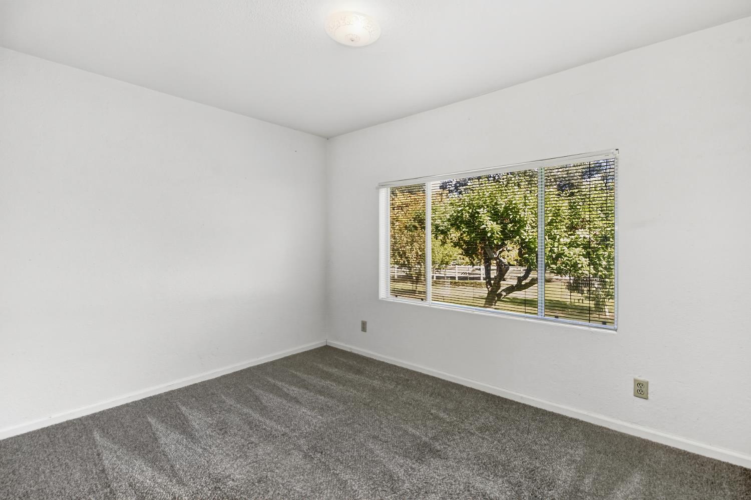 3140 Brennans Road Loomis, CA 95650 - Photo 24 of 45 an empty room with a window