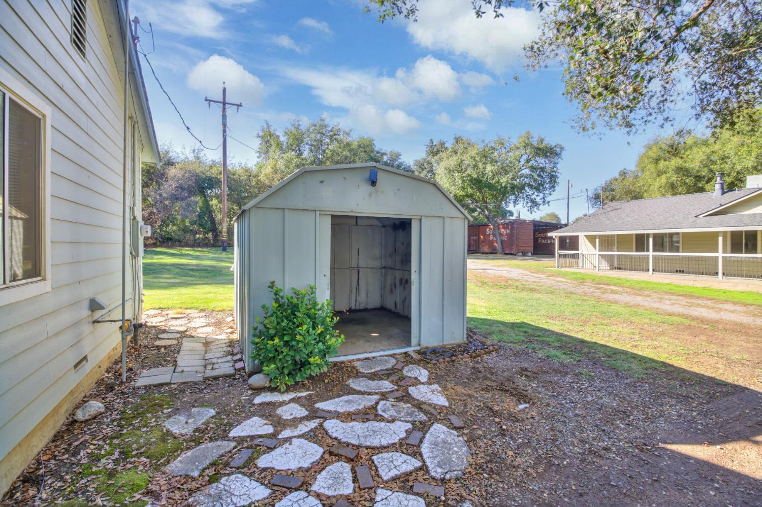 3140 Brennans Road Loomis, CA 95650 - Photo 26 of 45 a front view of a house with garden