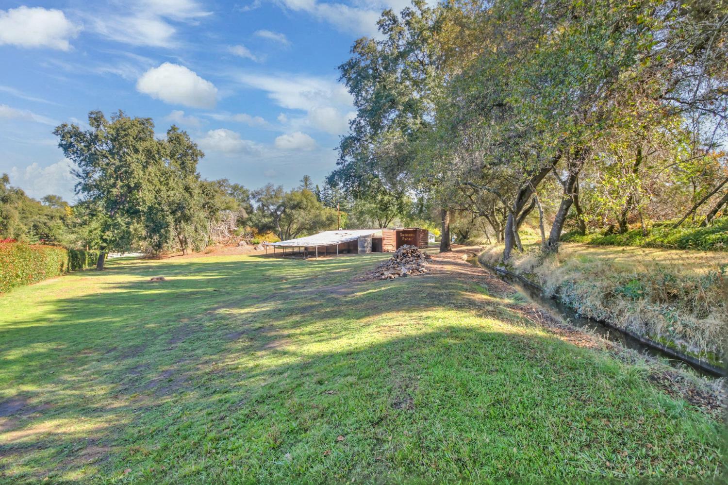 3140 Brennans Road Loomis, CA 95650 - Photo 38 of 45 a view of a park with large trees