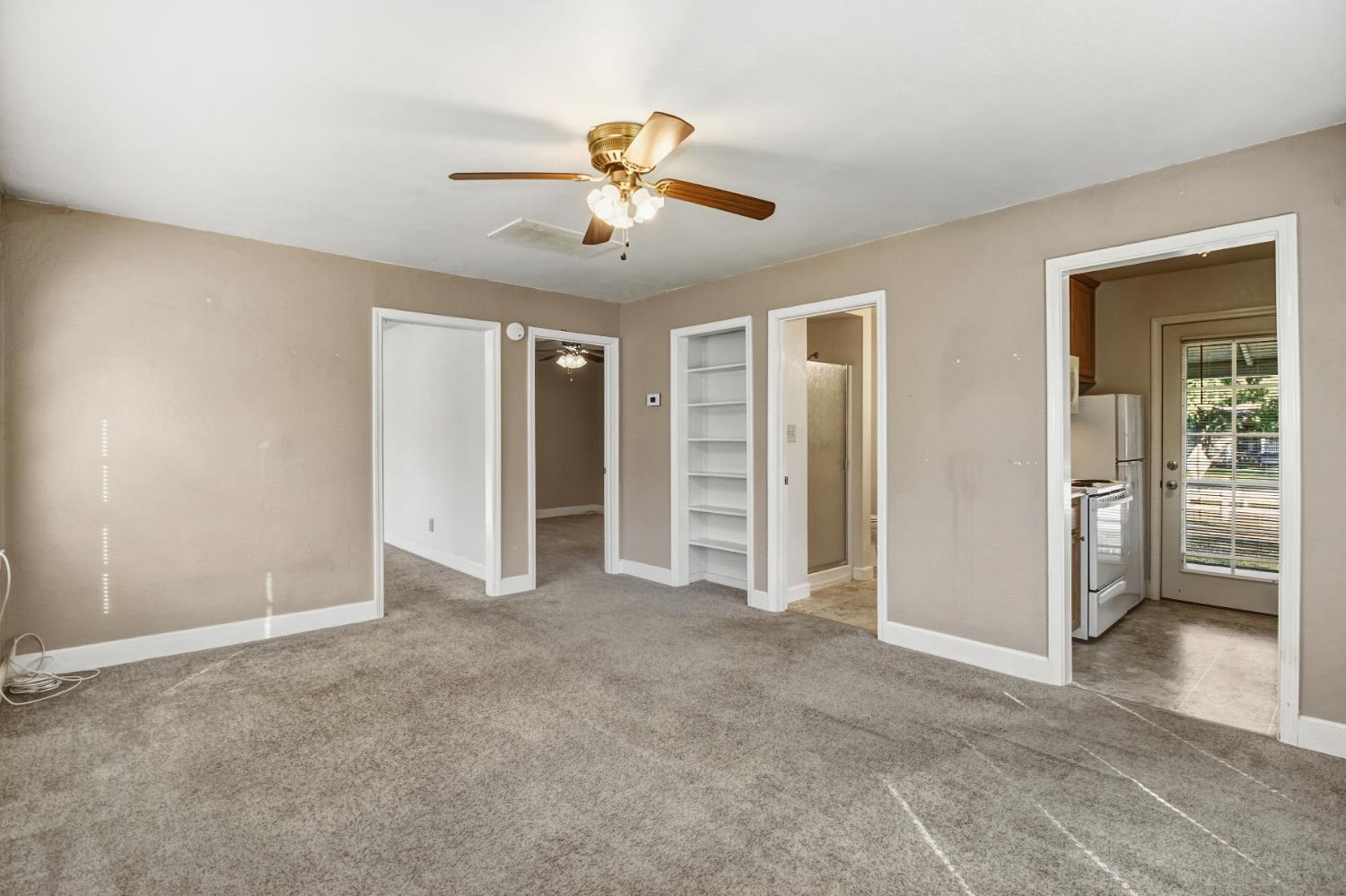 3140 Brennans Road Loomis, CA 95650 - Photo 7 of 45 an empty room with closet and a ceiling fan