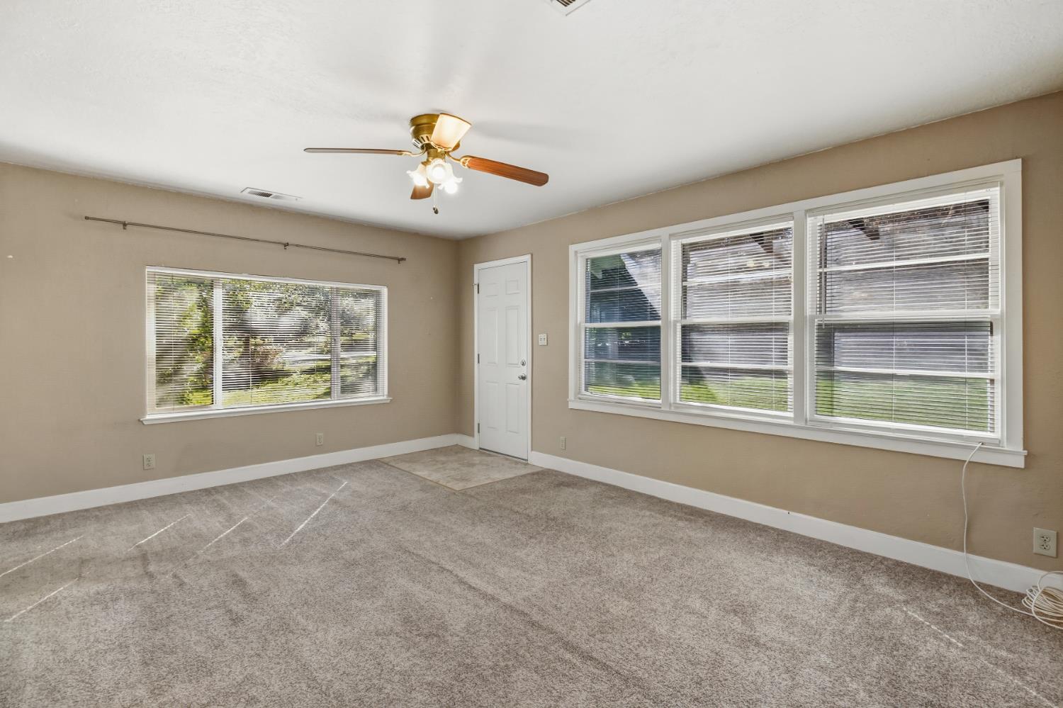 3140 Brennans Road Loomis, CA 95650 - Photo 8 of 45 a view of an empty room with a window