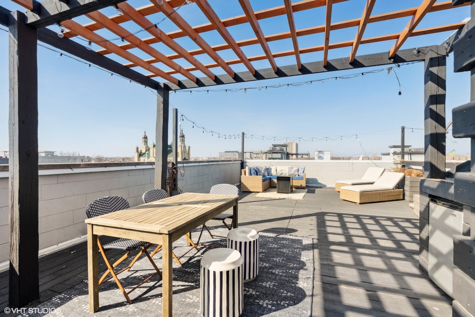 2207 West Chicago Avenue, Unit 3W Chicago, IL 60622 - Photo 12 of 15 a view of a chairs and table in the balcony
