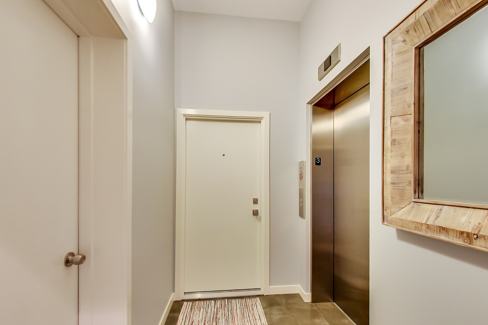 2207 West Chicago Avenue, Unit 3W Chicago, IL 60622 - Photo 14 of 15 a view of a bathroom from a hallway